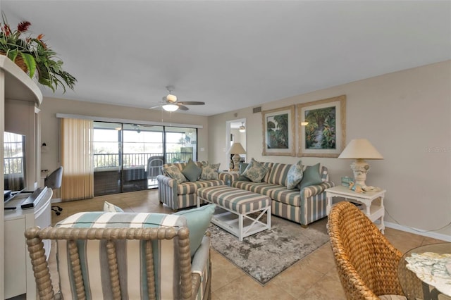 living room with ceiling fan and light tile patterned floors