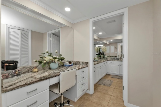 bathroom with vanity, tile patterned flooring, and ornamental molding