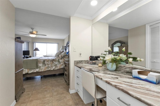 tiled bedroom with ornamental molding and ceiling fan