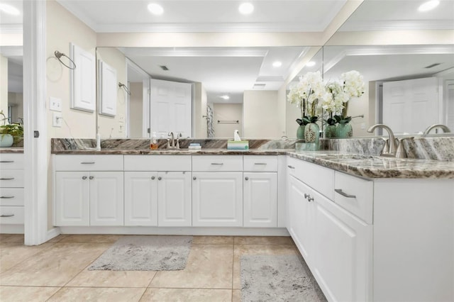 bathroom with beamed ceiling, vanity, tile patterned floors, and crown molding