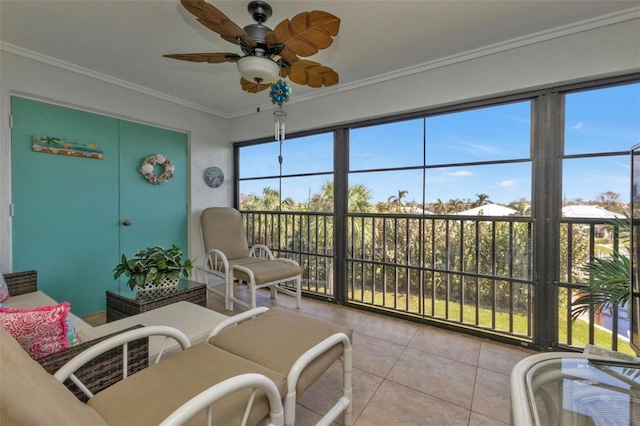 sunroom / solarium with ceiling fan