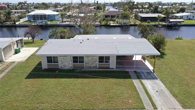 drone / aerial view with a water view