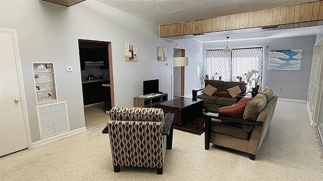 554 Lindley Ter, Port Charlotte, FL 33952 - living area featuring baseboards