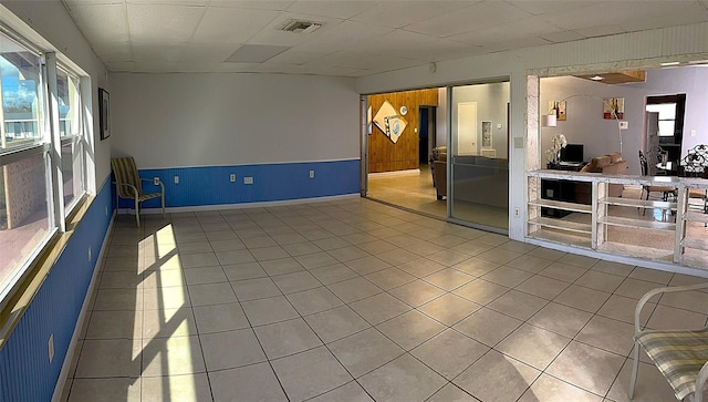 empty room with light tile patterned floors