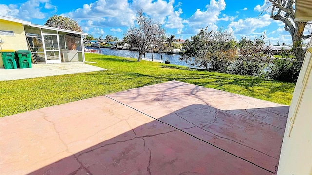 view of patio featuring a water view