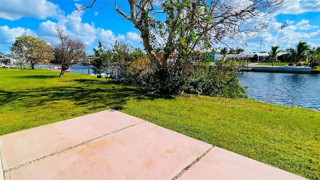 view of yard with a water view