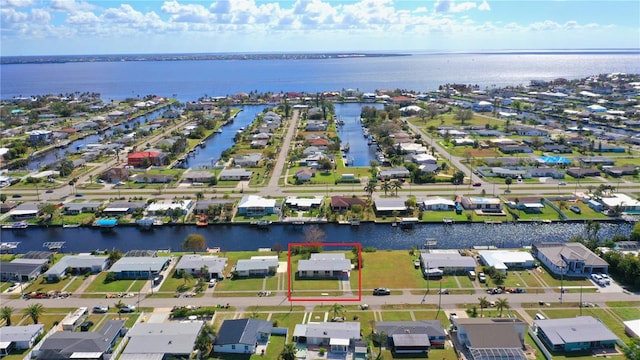 bird's eye view with a water view