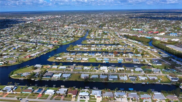 554 Lindley Ter, Port Charlotte, FL 33952 - aerial view of property's location with a large body of water and nearby suburban area