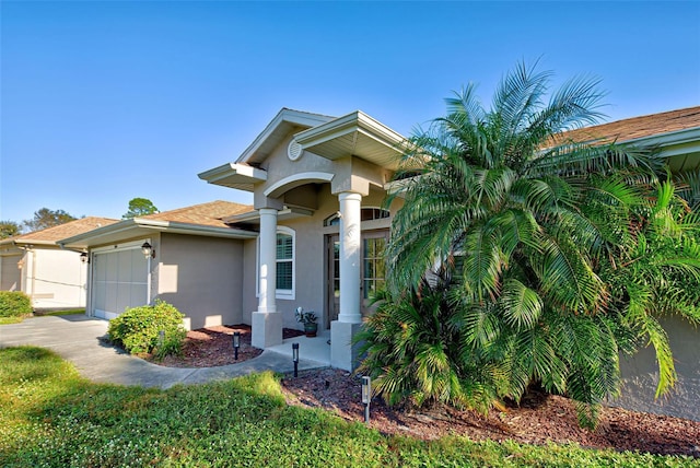 view of front of property featuring a garage