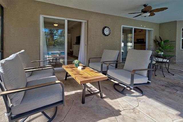 view of patio with ceiling fan