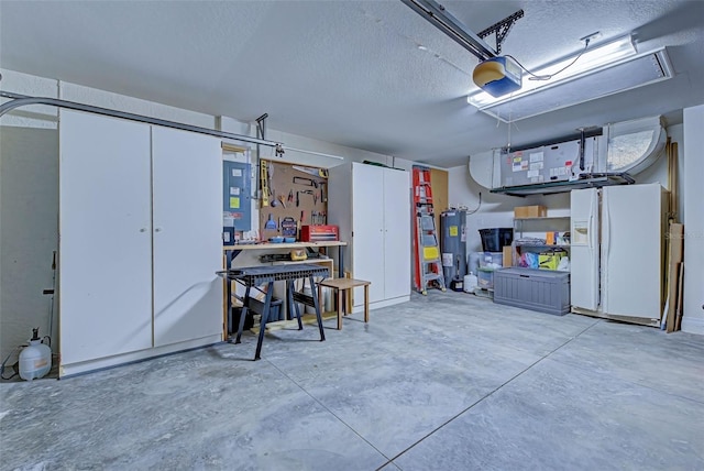 garage with electric water heater, a garage door opener, and white refrigerator with ice dispenser