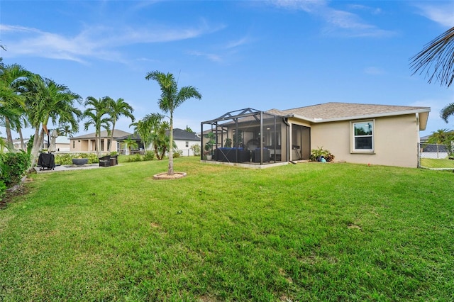 view of yard with a lanai