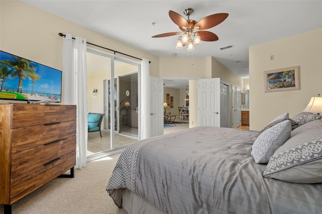 bedroom featuring ceiling fan and light carpet