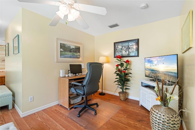 office featuring hardwood / wood-style flooring and ceiling fan