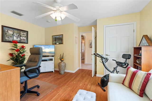 office area featuring light wood-type flooring and ceiling fan