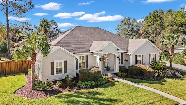 ranch-style house featuring a front lawn