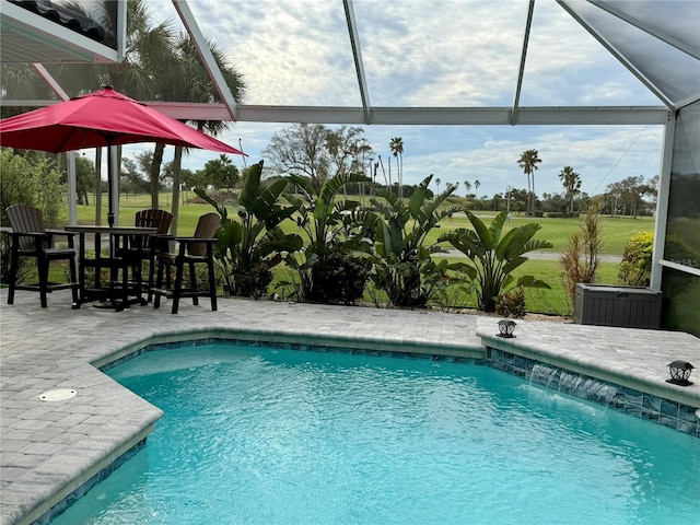 5101 Pine Shadow Ln, North Port, FL 34287 - outdoor pool featuring a patio area, a lanai, and golf course view
