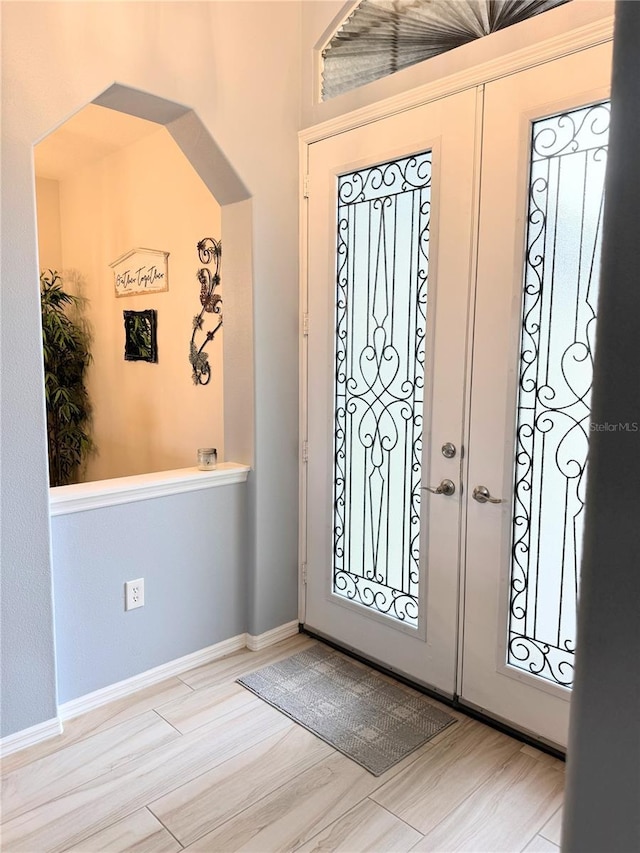 5101 Pine Shadow Ln, North Port, FL 34287 - entrance foyer with baseboards and wood finished floors