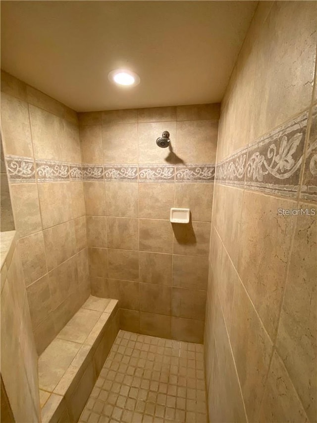 5101 Pine Shadow Ln, North Port, FL 34287 - bathroom featuring tiled shower and recessed lighting