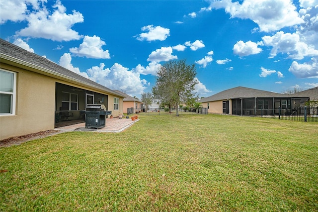 view of yard featuring a sunroom