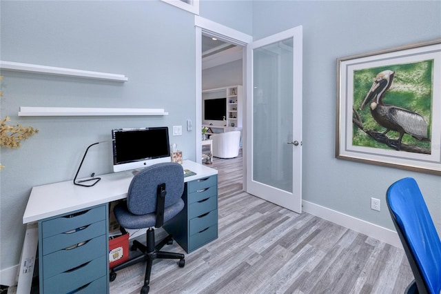 office area featuring light hardwood / wood-style flooring