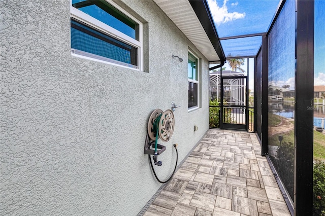 1450 Kiwi Ct, Punta Gorda, FL 33950 - unfurnished sunroom featuring a water view
