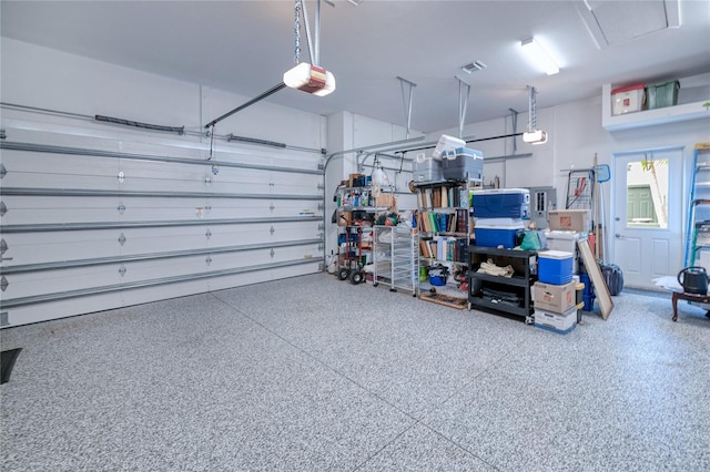 1450 Kiwi Ct, Punta Gorda, FL 33950 - garage featuring a garage door opener