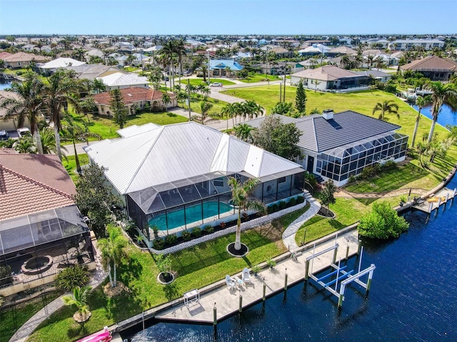 bird's eye view with a water view