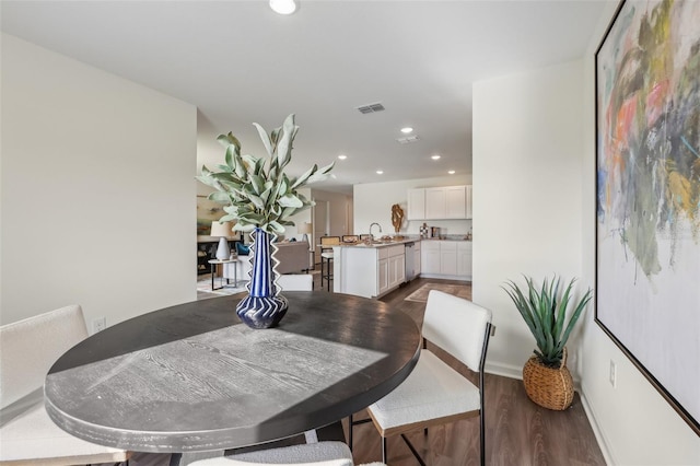 16307 Alcira Cir, Punta Gorda, FL 33955 - dining room with wood finished floors and recessed lighting