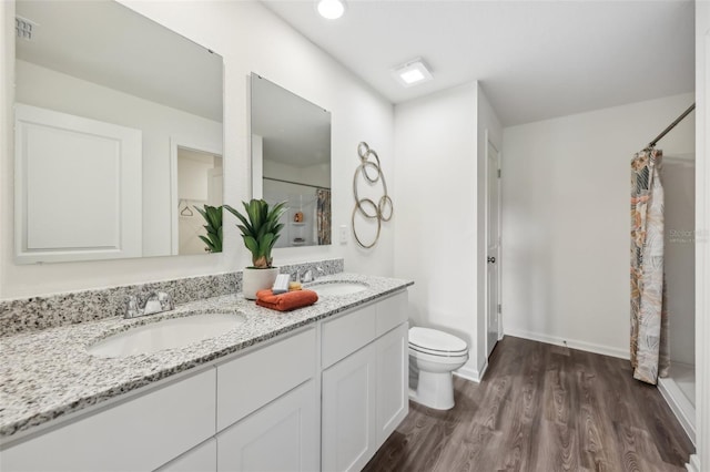 16307 Alcira Cir, Punta Gorda, FL 33955 - full bath featuring curtained shower, double vanity, and wood finished floors