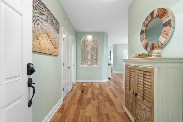 hallway featuring light wood-type flooring