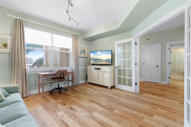 268 Lewis Cir Unit 132, Punta Gorda, FL 33950 - office area featuring french doors and light wood-style flooring