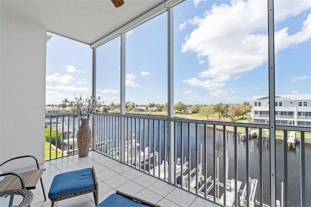 balcony featuring a water view