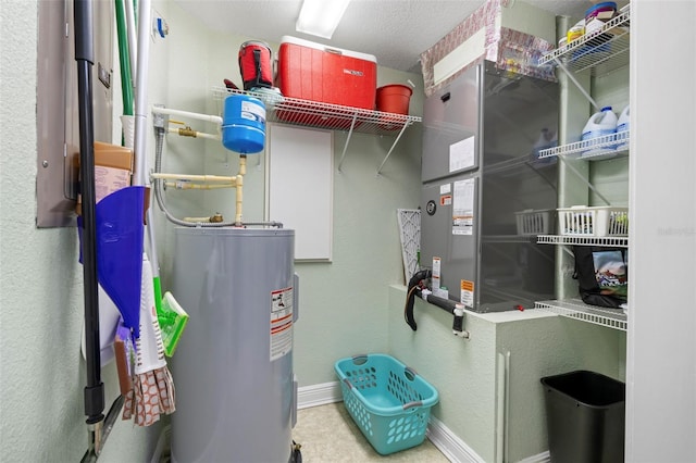 utility room with water heater and heating unit