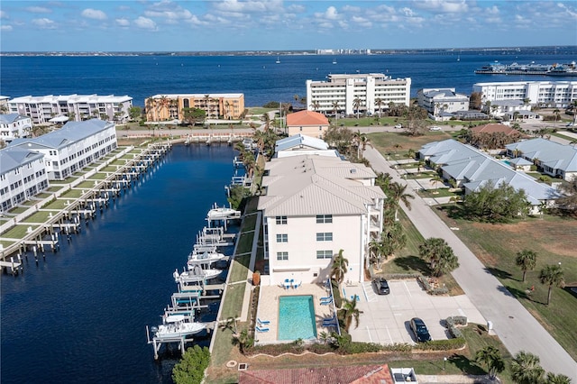 birds eye view of property featuring a water view