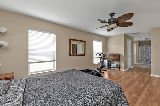 bedroom featuring ceiling fan and light wood-type flooring