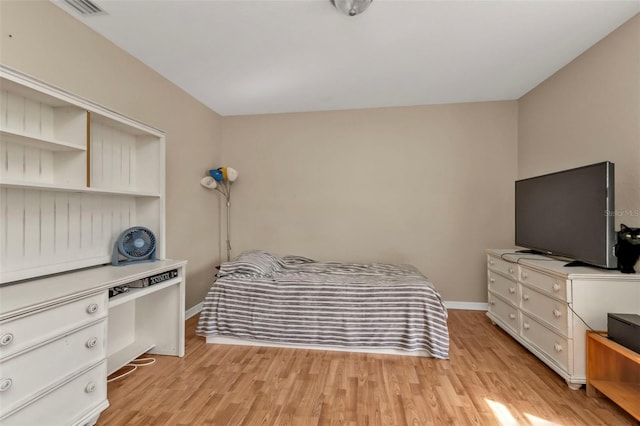 bedroom featuring light wood-type flooring