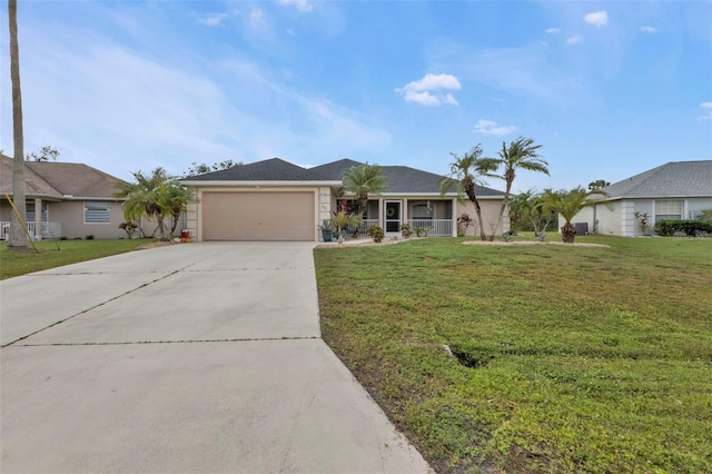 single story home featuring a garage and a front lawn