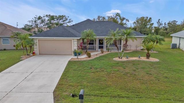 single story home featuring a garage, central AC, covered porch, and a front yard