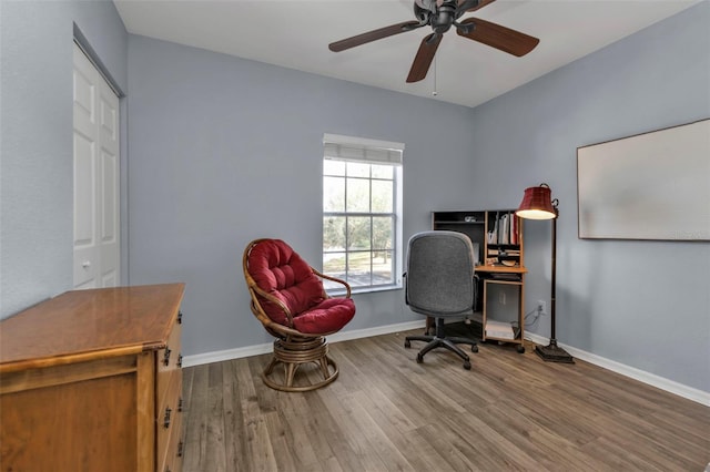 home office featuring ceiling fan and wood-type flooring