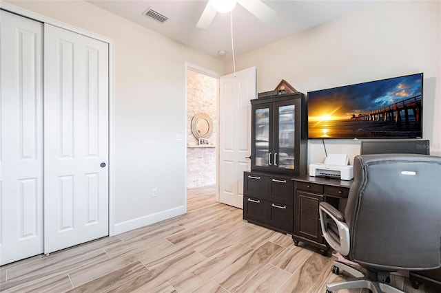 office area featuring ceiling fan and light hardwood / wood-style flooring