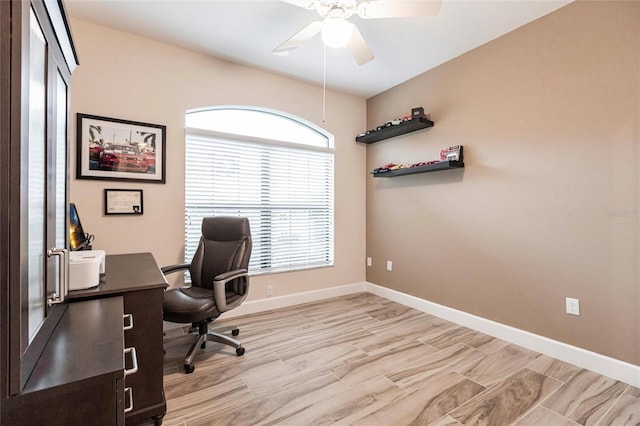 office area featuring light hardwood / wood-style floors and ceiling fan