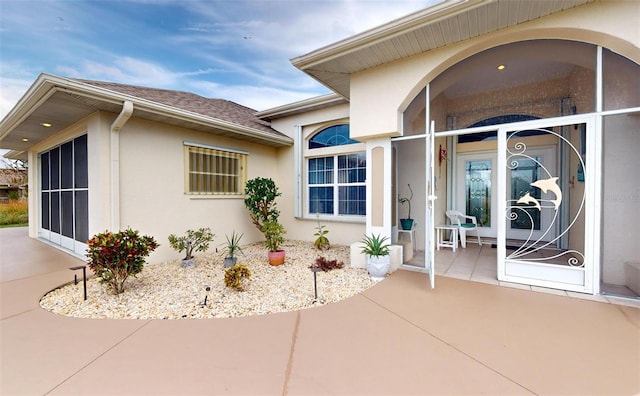 198 Coblentz St, Port Charlotte, FL 33954 - view of exterior entry with stucco siding