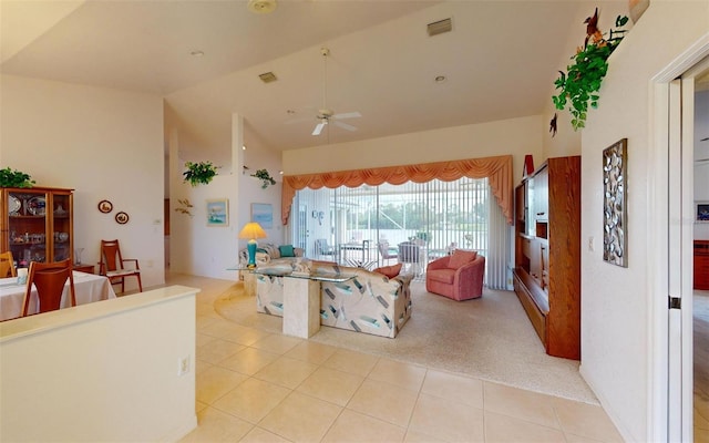 198 Coblentz St, Port Charlotte, FL 33954 - living area featuring a ceiling fan, light tile patterned floors, and high vaulted ceiling