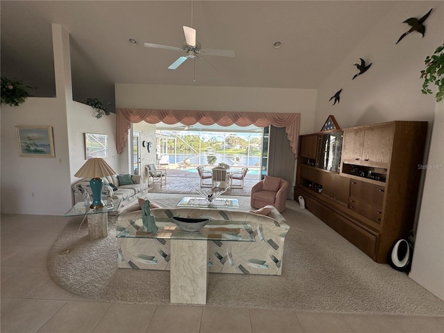 living room with light tile patterned floors and ceiling fan