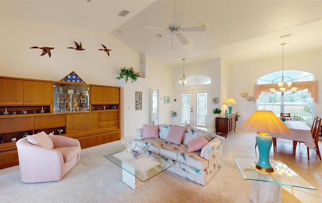 198 Coblentz St, Port Charlotte, FL 33954 - living room featuring high vaulted ceiling, a chandelier, ceiling fan, and light colored carpet