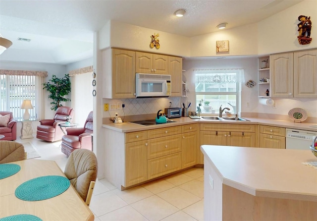 198 Coblentz St, Port Charlotte, FL 33954 - kitchen with white appliances, a sink, open floor plan, light brown cabinets, and healthy amount of natural light