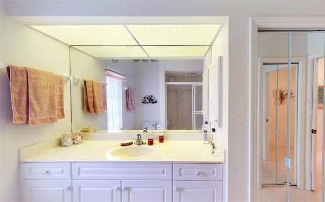 198 Coblentz St, Port Charlotte, FL 33954 - bathroom featuring toilet, a stall shower, and vanity