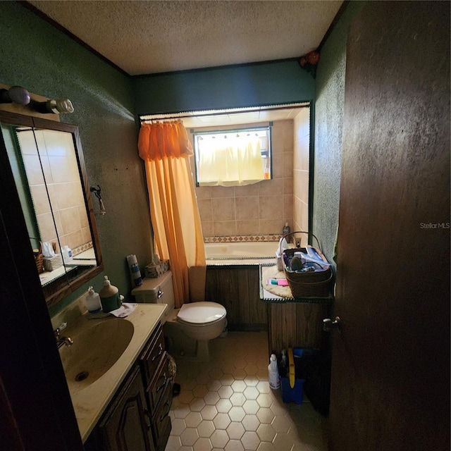 bathroom with vanity, tile patterned flooring, toilet, and a textured ceiling