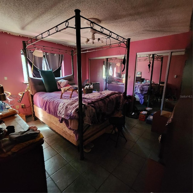 bedroom featuring a closet and a textured ceiling